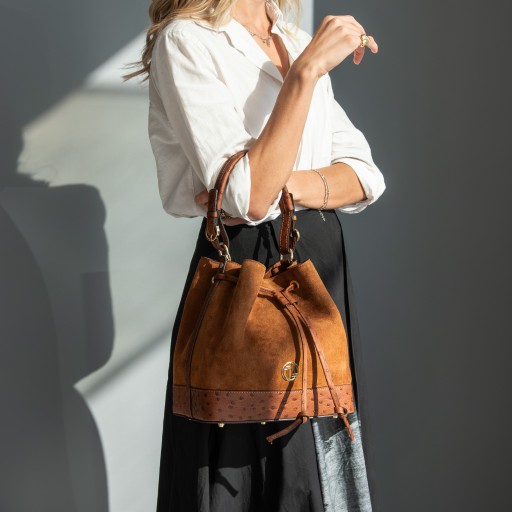 Ostrea Suede and ostrich effect printed leather bucket bag